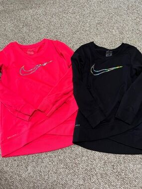 Two girls Nike tops